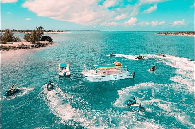 Jet Skiing around La famille ship and smaller pristine cays - Noah’s Ark Ocean Bar: The Optional Party Stop You Can Plan For