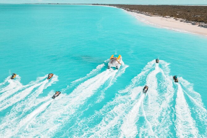 Jet Skiing around La famille ship and smaller pristine cays - Getting to Caribbean Cruisin at TCI Ferry: Start Point That Matters