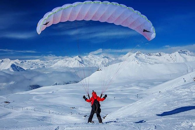 Private Full Day Skiing Trip To Gudauri from T'bilisi - What you can add at Gudauri: paragliding, snow options, and all-in-one activity energy