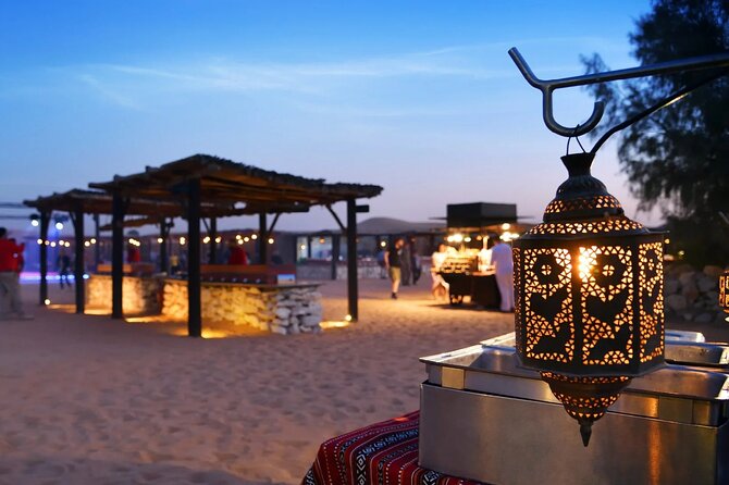 Red Desert Safari With Camel Ride & Sand Skiing - Sunset from high dunes: the calm moment before the camp lights